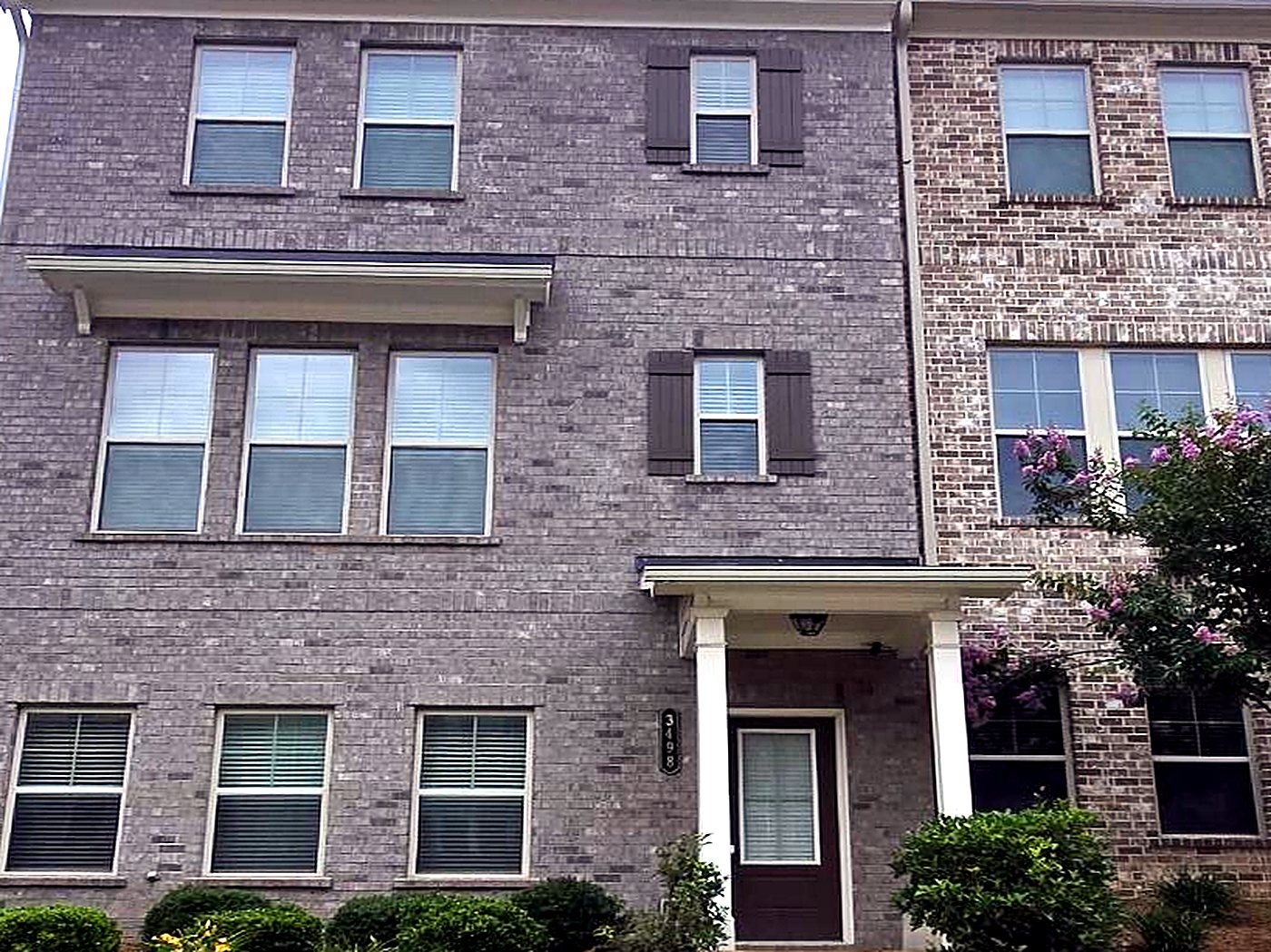 Multi-story brick townhome managed by Renting My Way